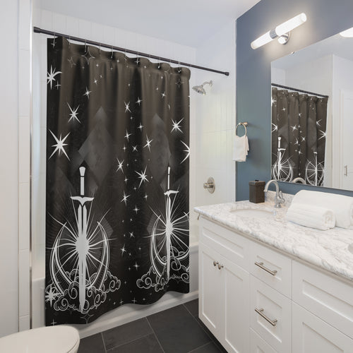 Gothic shower curtain with two celestial swords rising from swirling clouds surrounded by starburst halos and eight-pointed stars in white linework on deep charcoal black displayed in a white bathroom