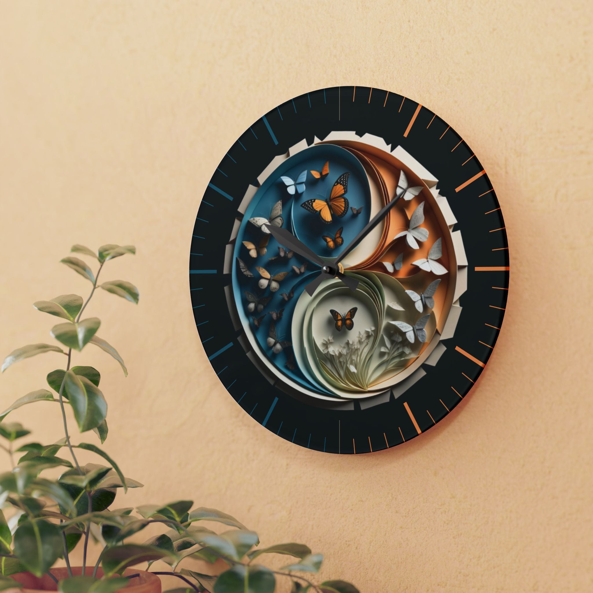 Round acrylic wall clock featuring a layered paper-fold yin yang with a teal cream butterfly half and warm orange butterfly half with a sage floral center and alternating teal and orange minute markers on a deep dark outer dial with black hour and minute hands