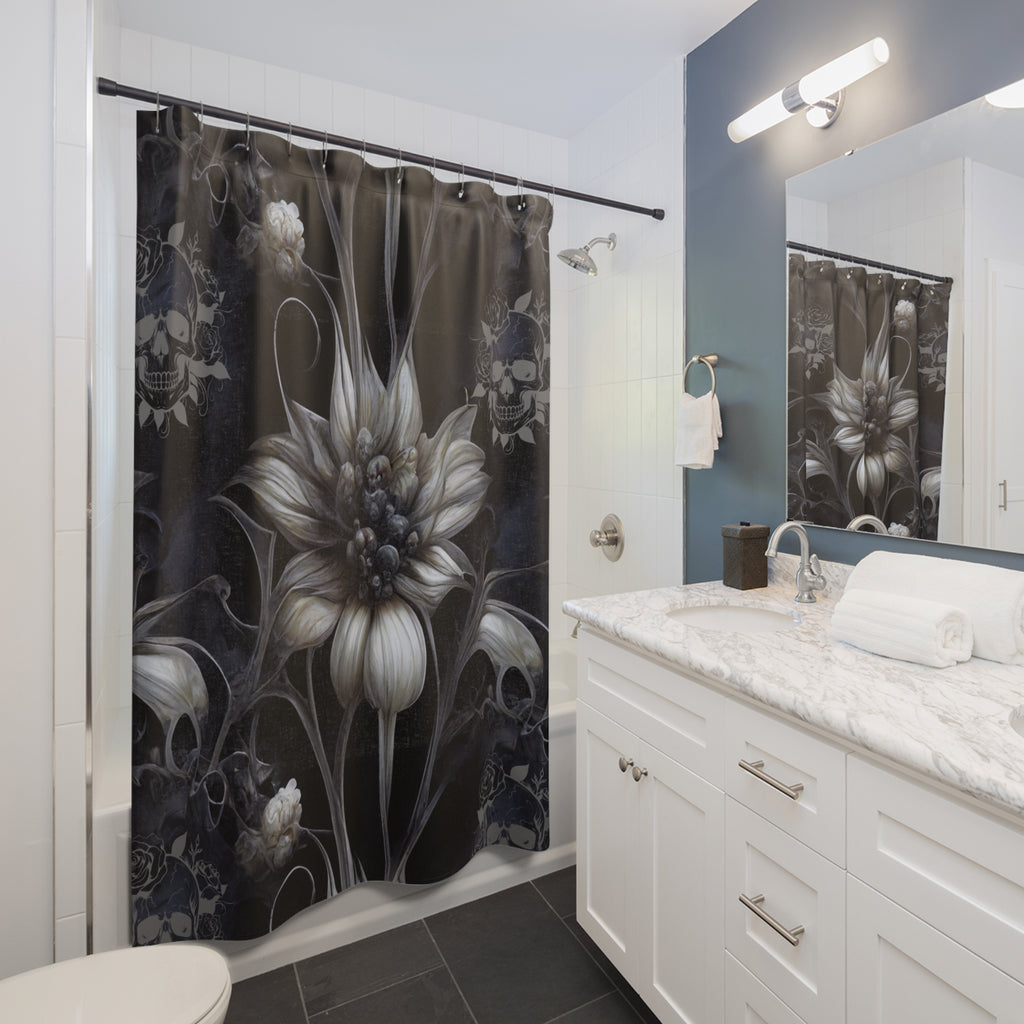 Gothic shower curtain featuring a large pale botanical bloom with skull and rose details on a dark charcoal background