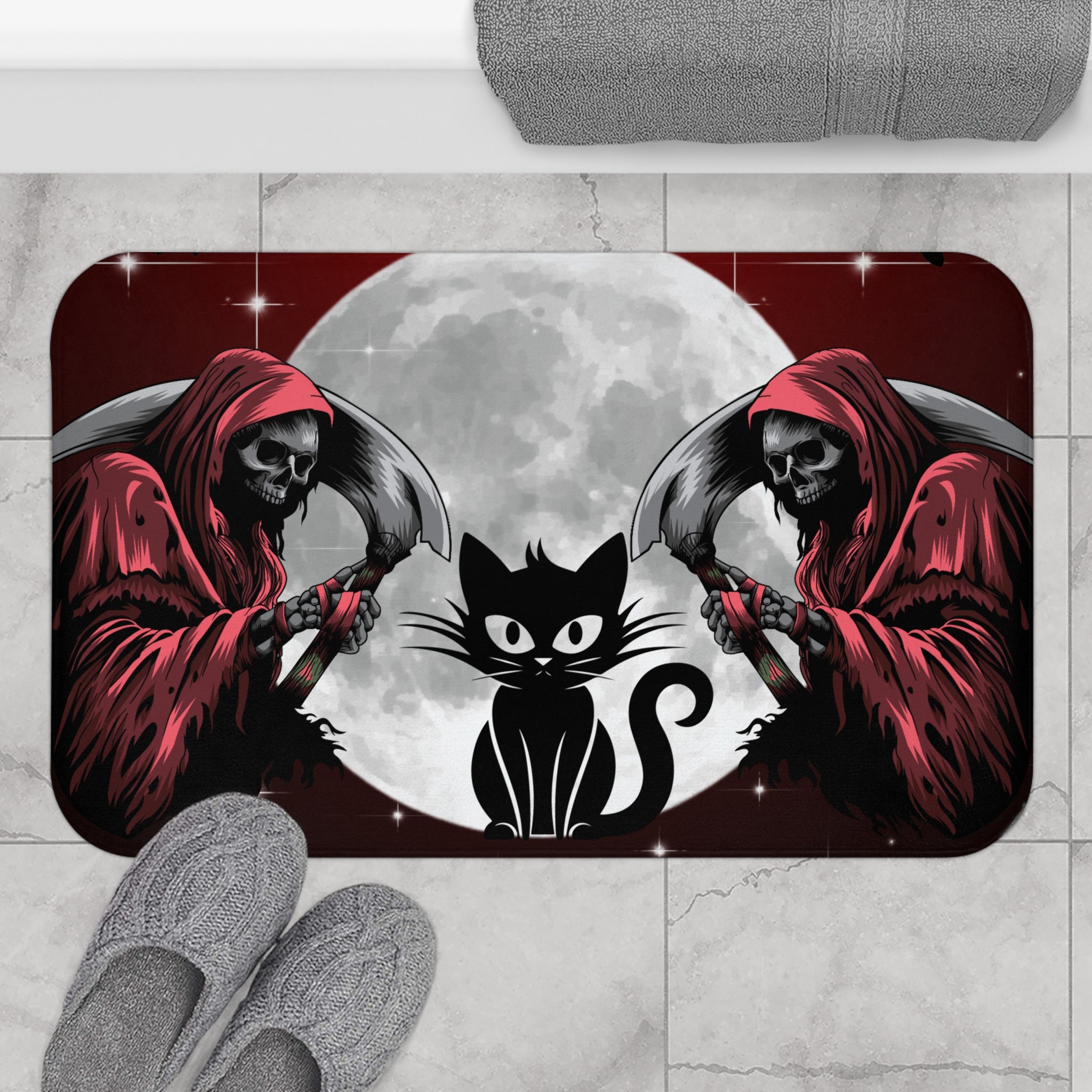 Gothic bath mat with twin crimson-robed grim reapers and black cat silhouette beneath a full moon on a deep red background