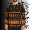 Halloween-themed sweater with pumpkins, skeletons, and bats on a dark background.