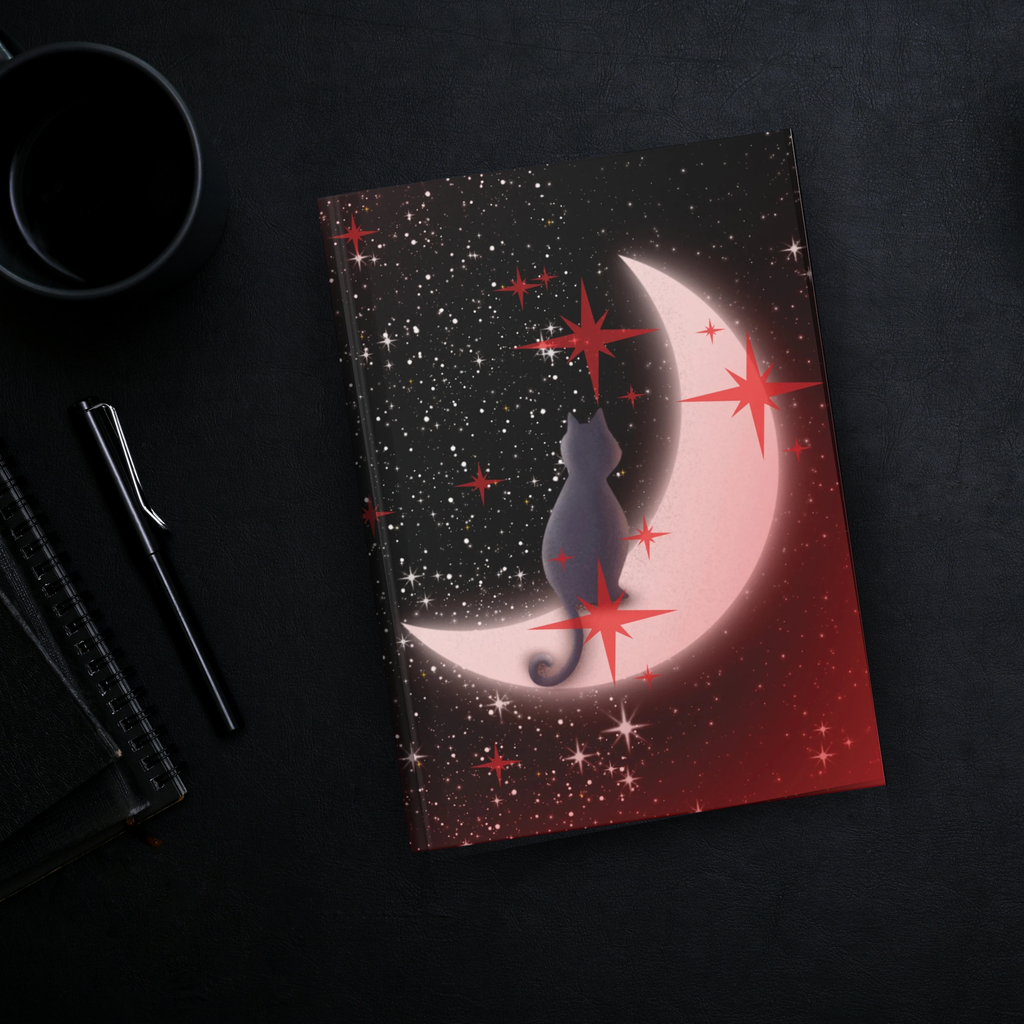 Gothic hardcover journal with black cat sitting on a glowing crescent moon against a deep crimson and black starfield with red starburst accents