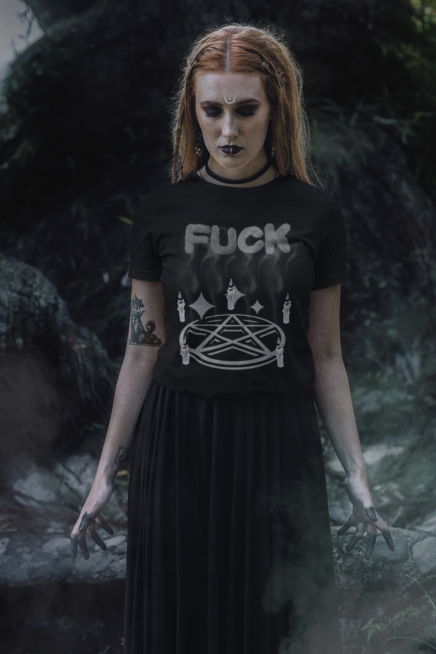 Black t-shirt with tonal grey "FUCK" in smoky letters above a pentagram circle surrounded by five candles with rising smoke and star accents