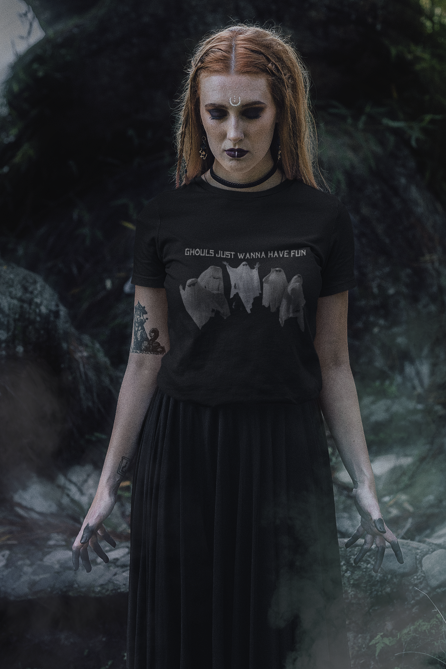 Black t-shirt with five smoky grey ghost silhouettes and "Ghouls Just Wanna Have Fun" text printed above them in small caps