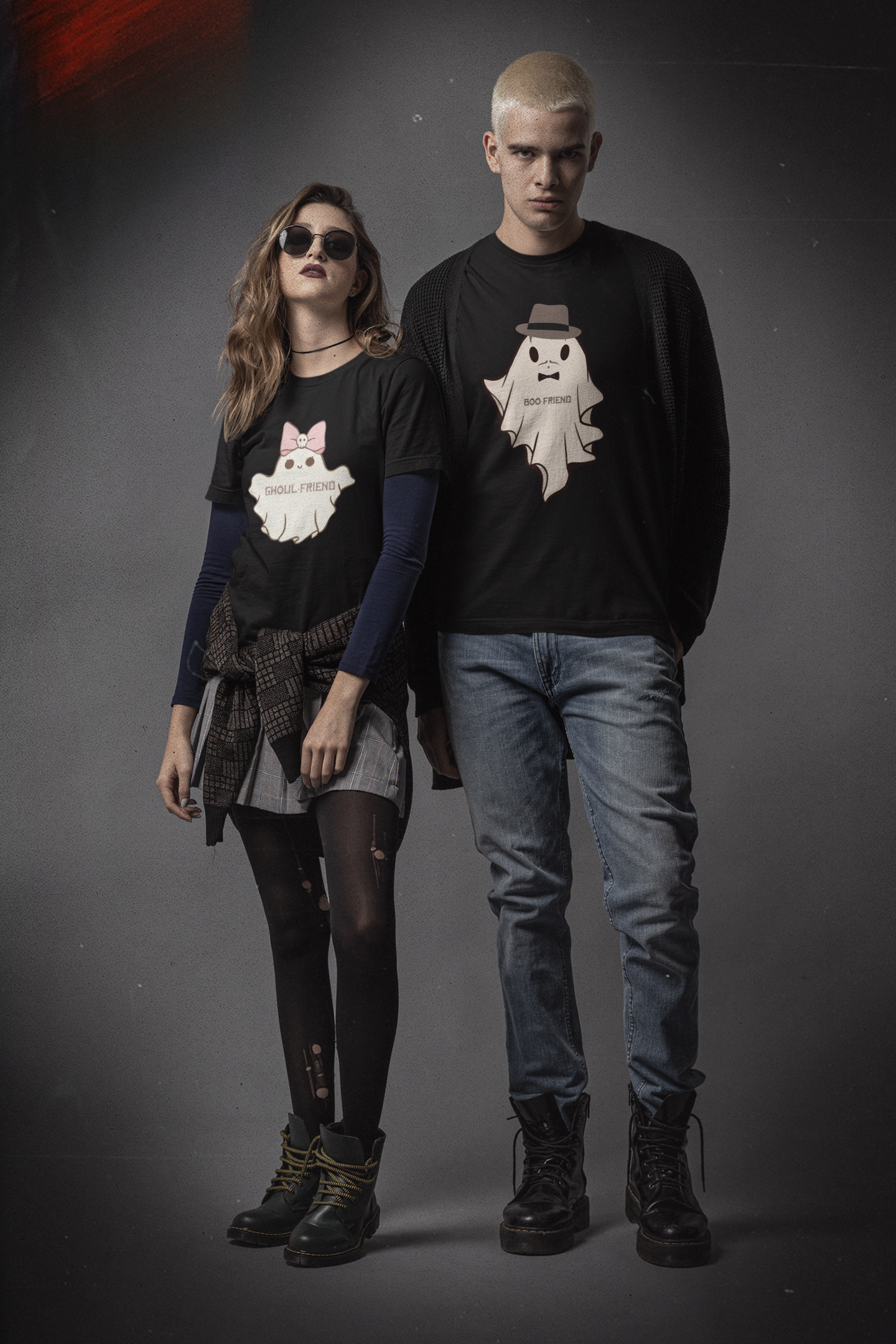 Black t-shirts with two kawaii ghost designs — "Ghoul-Friend" with pink bow and skull, and "Boo-Friend" with fedora and bow tie — worn as a matching couples set
