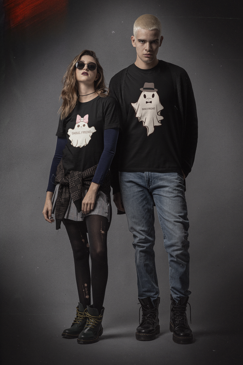 Black t-shirts with two kawaii ghost designs — "Ghoul-Friend" with pink bow and skull, and "Boo-Friend" with fedora and bow tie — worn as a matching couples set