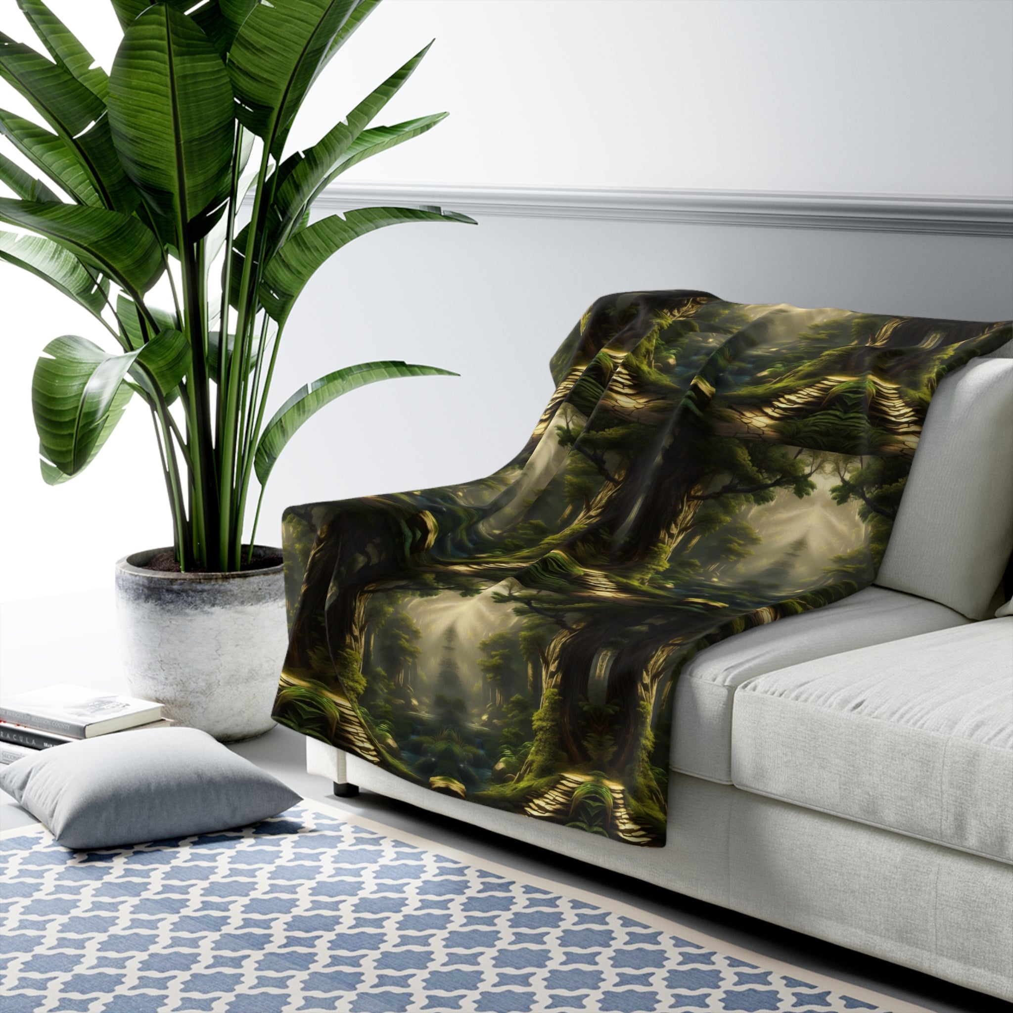 Dark green and gold throw blanket with ancient mossy forest scene featuring twisted roots, winding stone paths, and golden light filtering through tall canopy draped over a sofa
