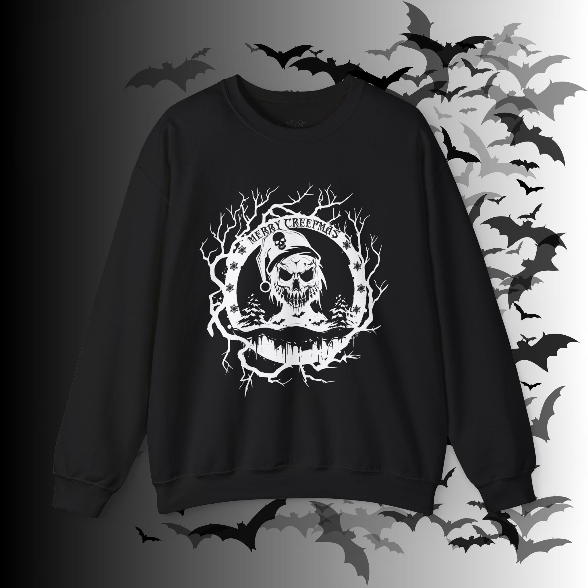 Black crewneck sweatshirt with white linework skull Santa in a dead branch wreath with pine trees, snowflakes, and "Merry Creepmas" text