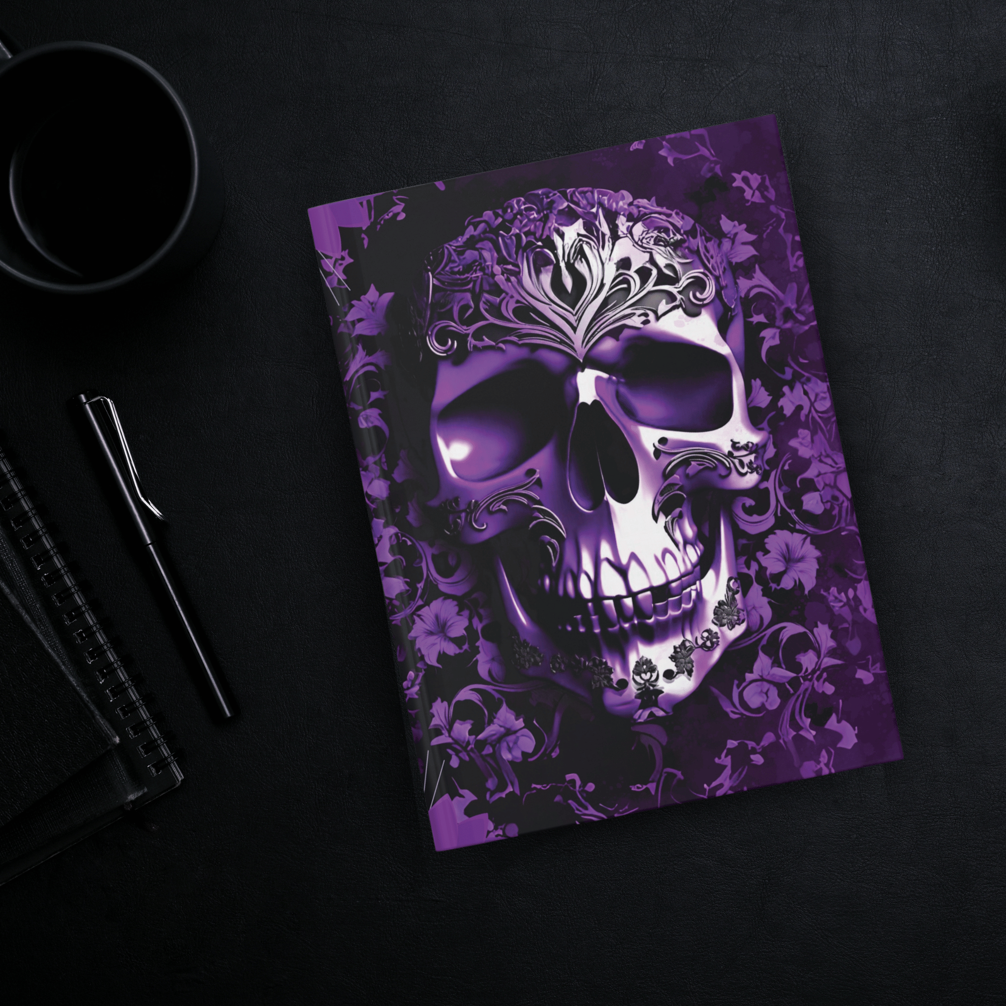 Gothic hardcover journal with a large ornate baroque skull surrounded by dark florals and ivy rendered in deep violet and black