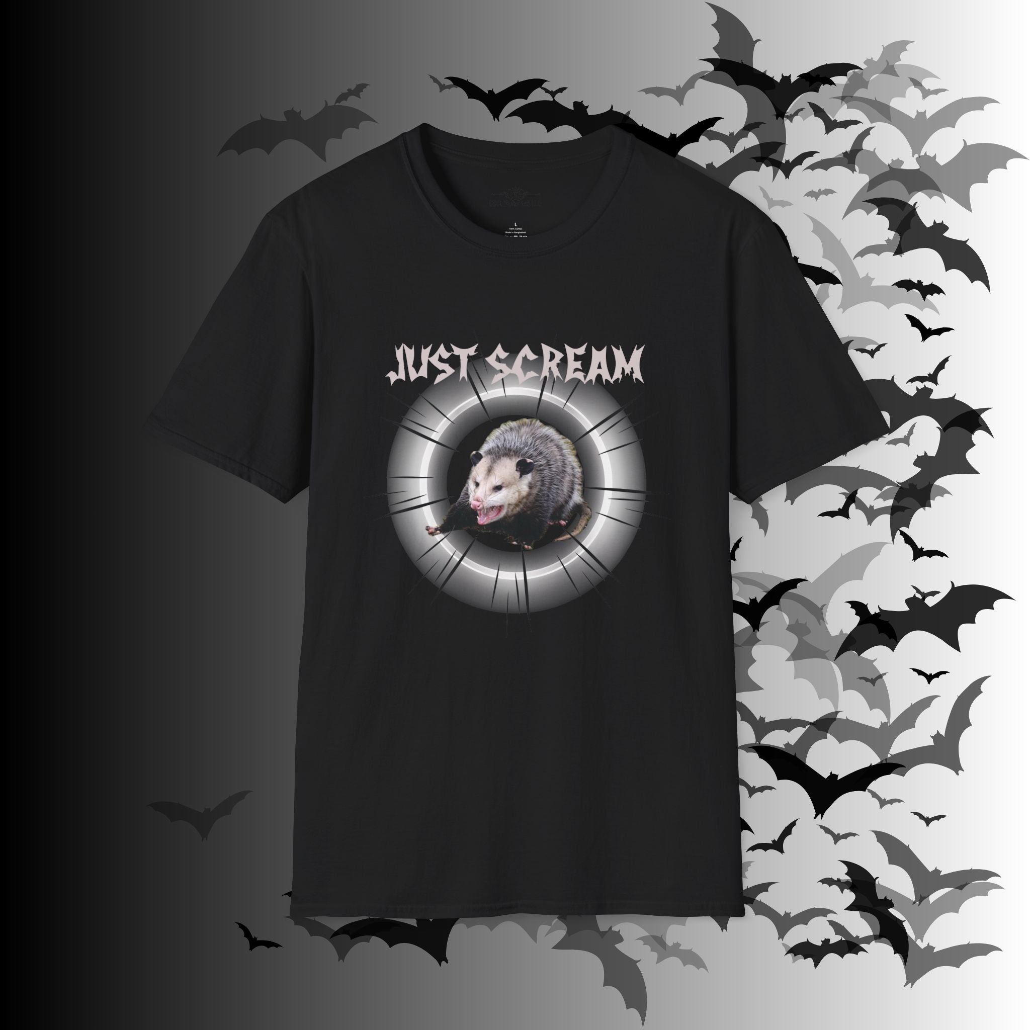 Black t-shirt with photo-realistic screaming possum inside a glowing silver spotlight circle with "Just Scream" gothic metal lettering above