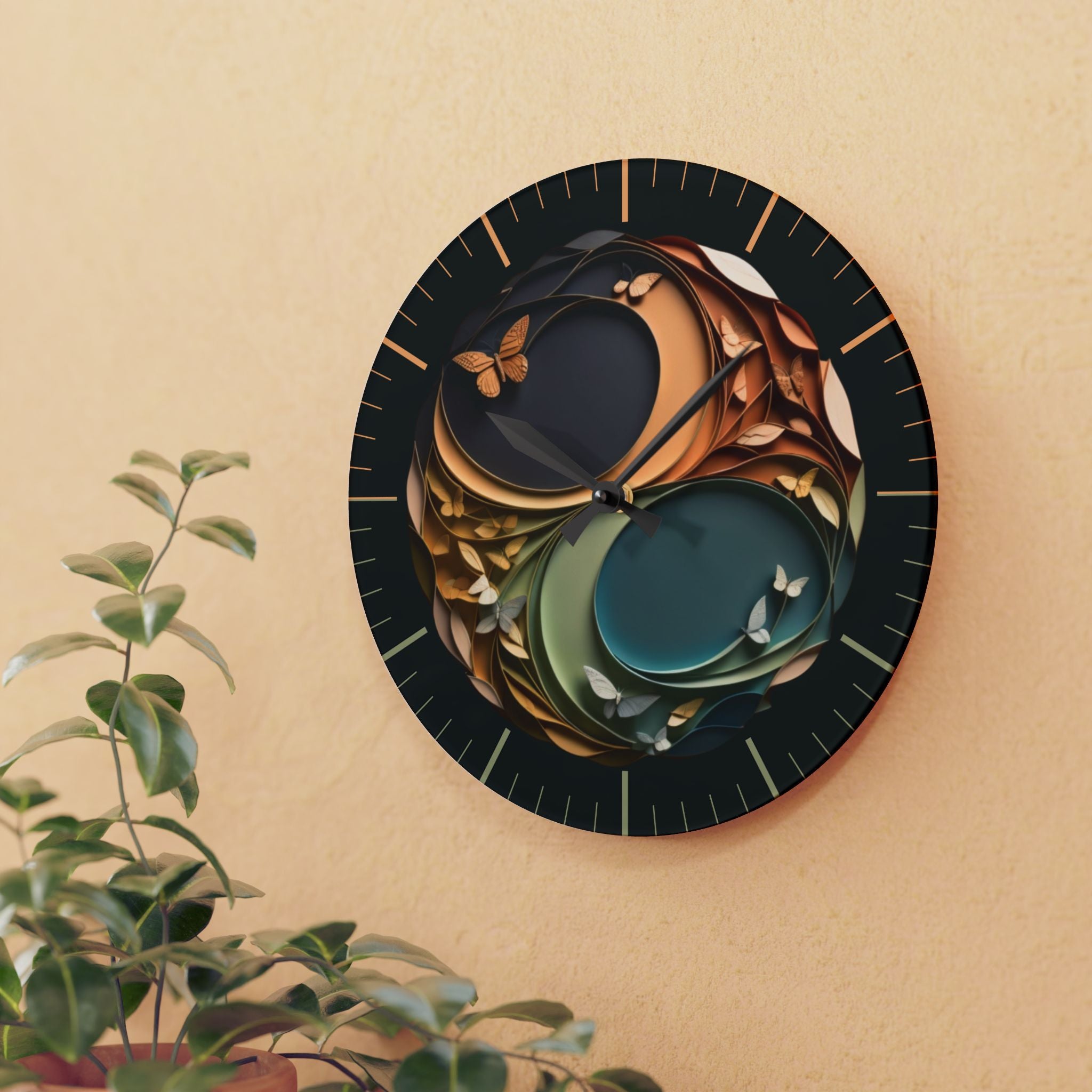 Round acrylic wall clock featuring a yin yang symbol in layered paper-fold curved forms with warm burnt orange and gold on one side and sage green and teal on the other with small butterflies and botanical leaves throughout on a deep dark background with gold minute markers and black hour and minute hands