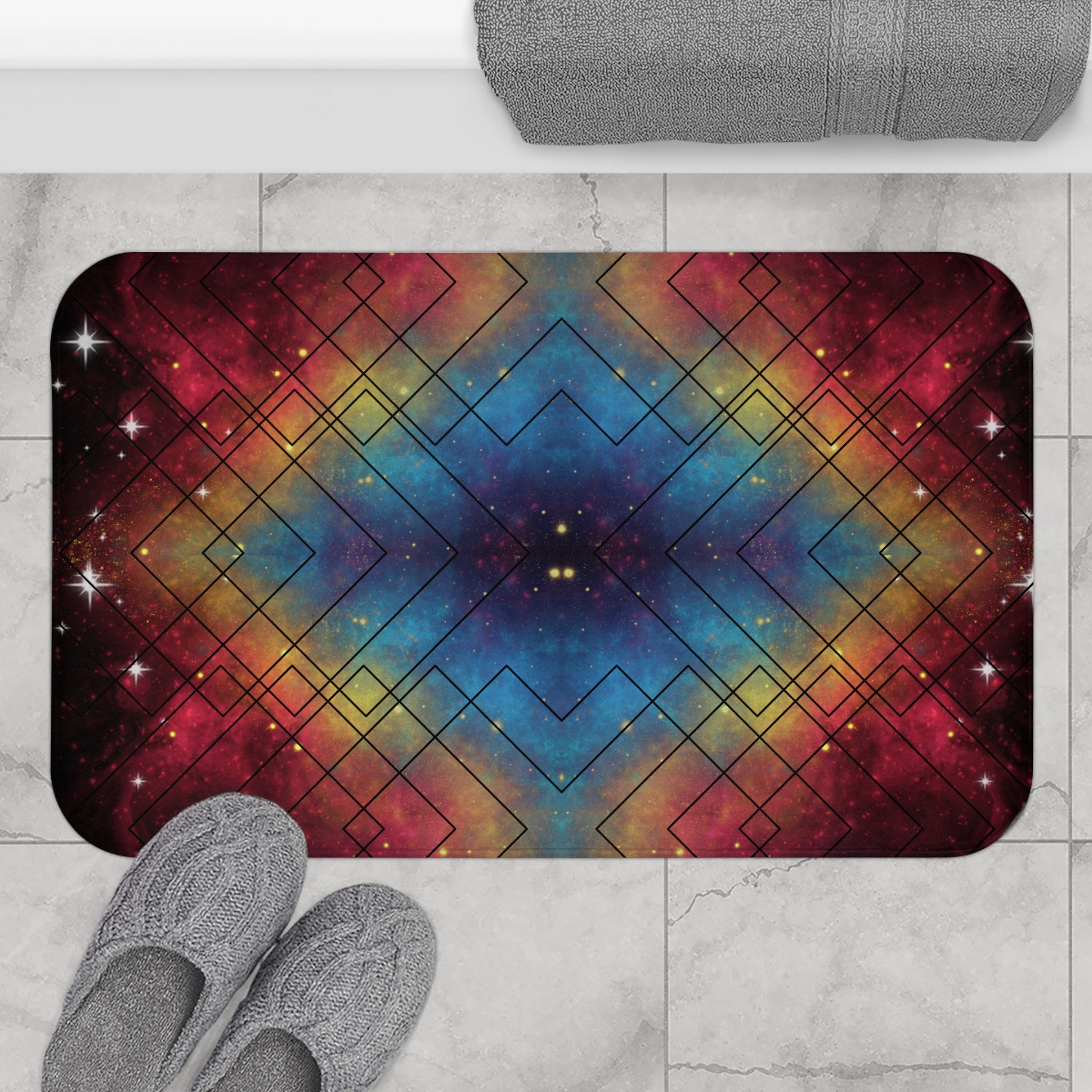 Bath mat with nebula galaxy gradient in blue, amber, and crimson with overlaid black geometric diamond grid pattern and star burst accents