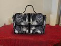 
Gothic botanical skull white lily rose waterproof canvas crossbody satchel purse charcoal black