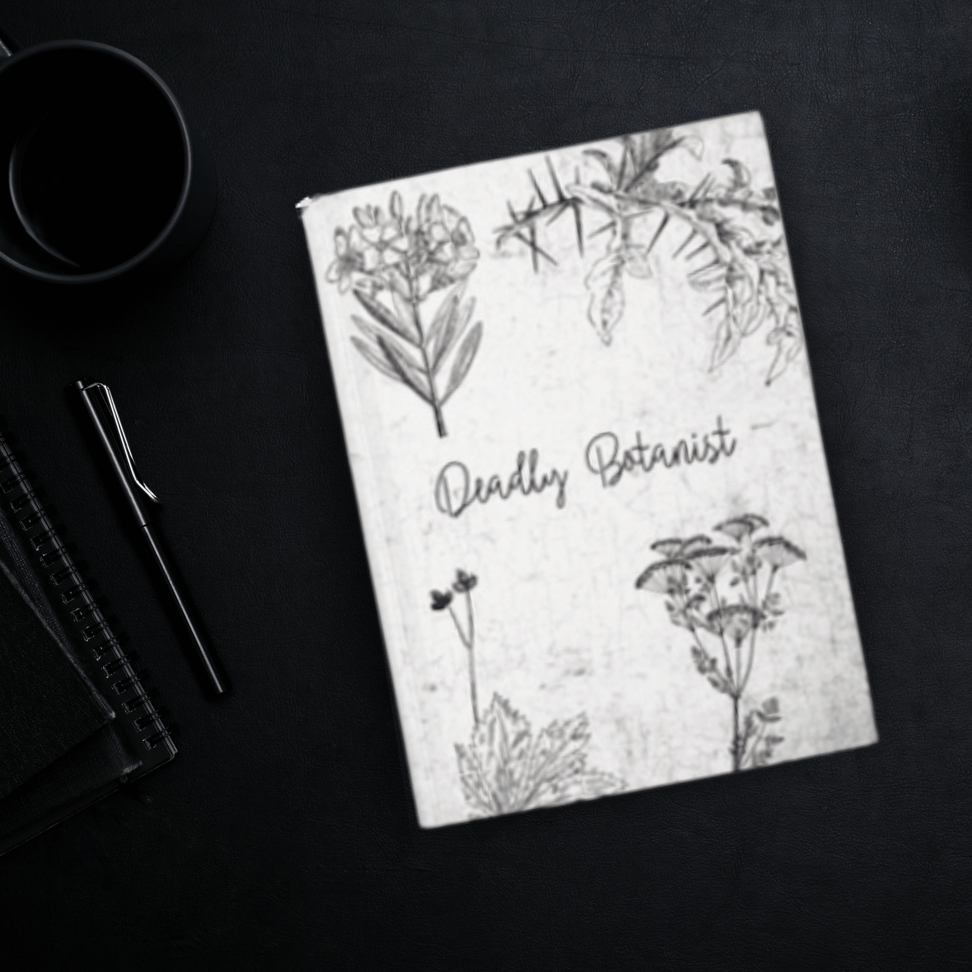 
Dark academia hardcover journal with detailed black ink poisonous plant botanical illustrations and "Deadly Botanist" script on a cracked white marble texture background