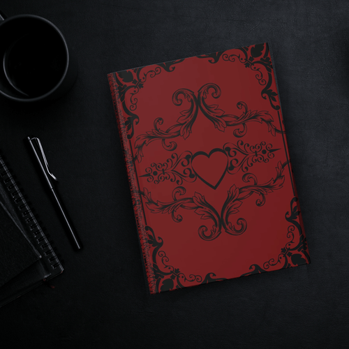 Gothic hardcover journal with black Victorian baroque scrollwork and centered heart design on a deep crimson red background